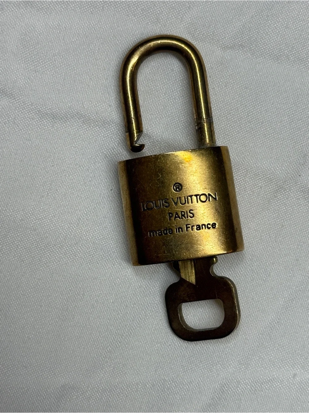 Louis Vuitton Gold Tone Monogram Padlock with Key # 300